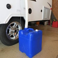 Gray water outlet for pop up camper